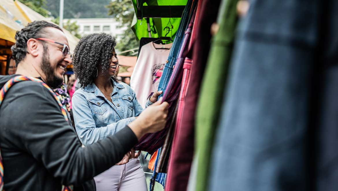 Friends shopping at an outdoor market