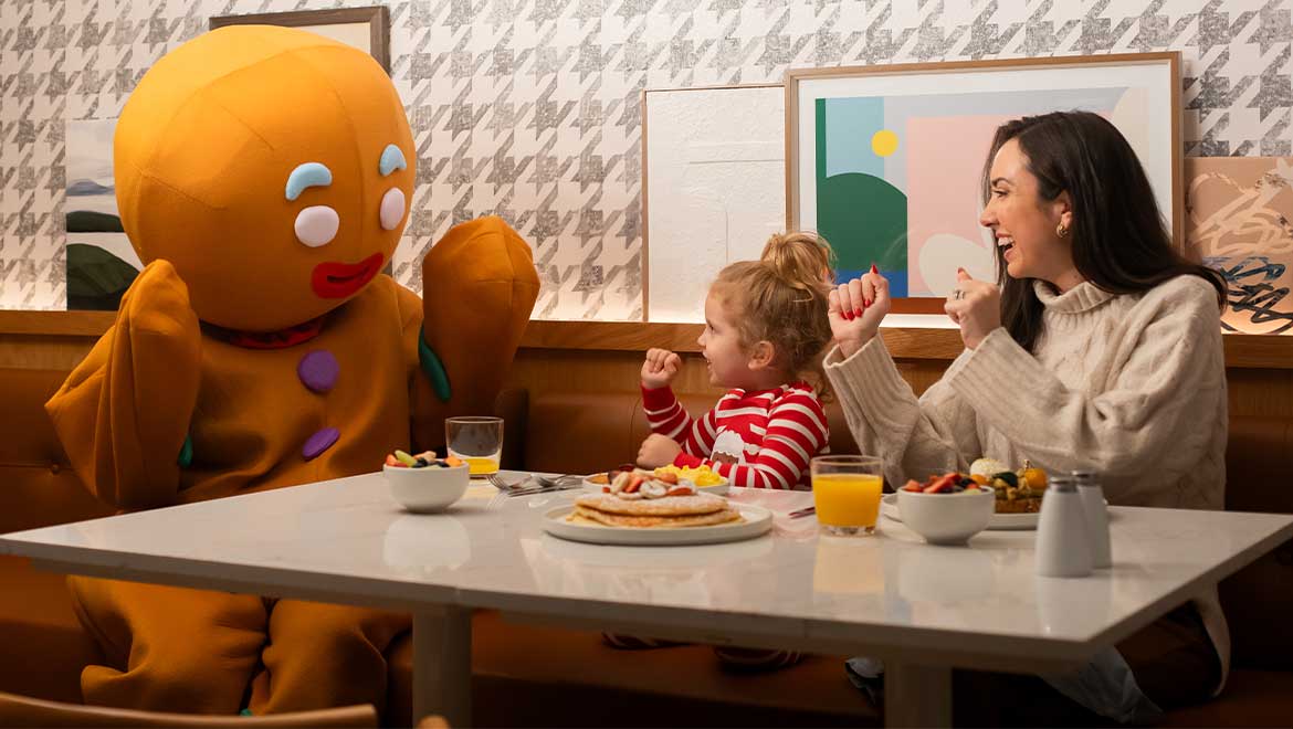 Mom and daughter having breakfast