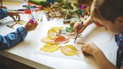 Kids doing fall crafts