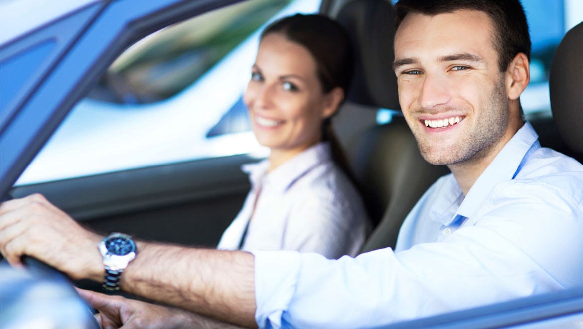 Couple riding in a car.