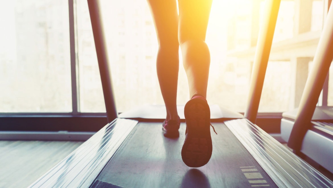 girl running on treadmill