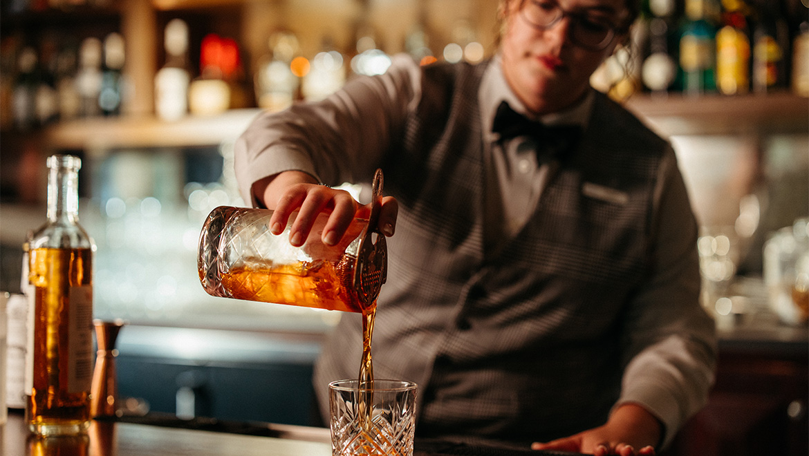 bartender pouring drink