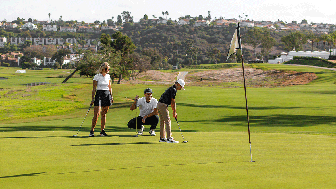 young kid putting with parents