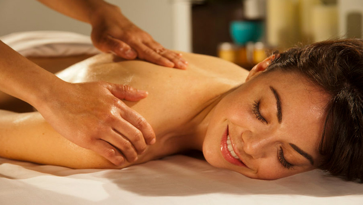 Woman receiving massage.