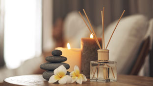 Candles, flowers and scent diffuser