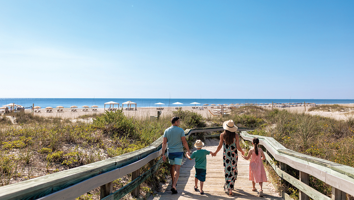 Family Walking to Beach at  