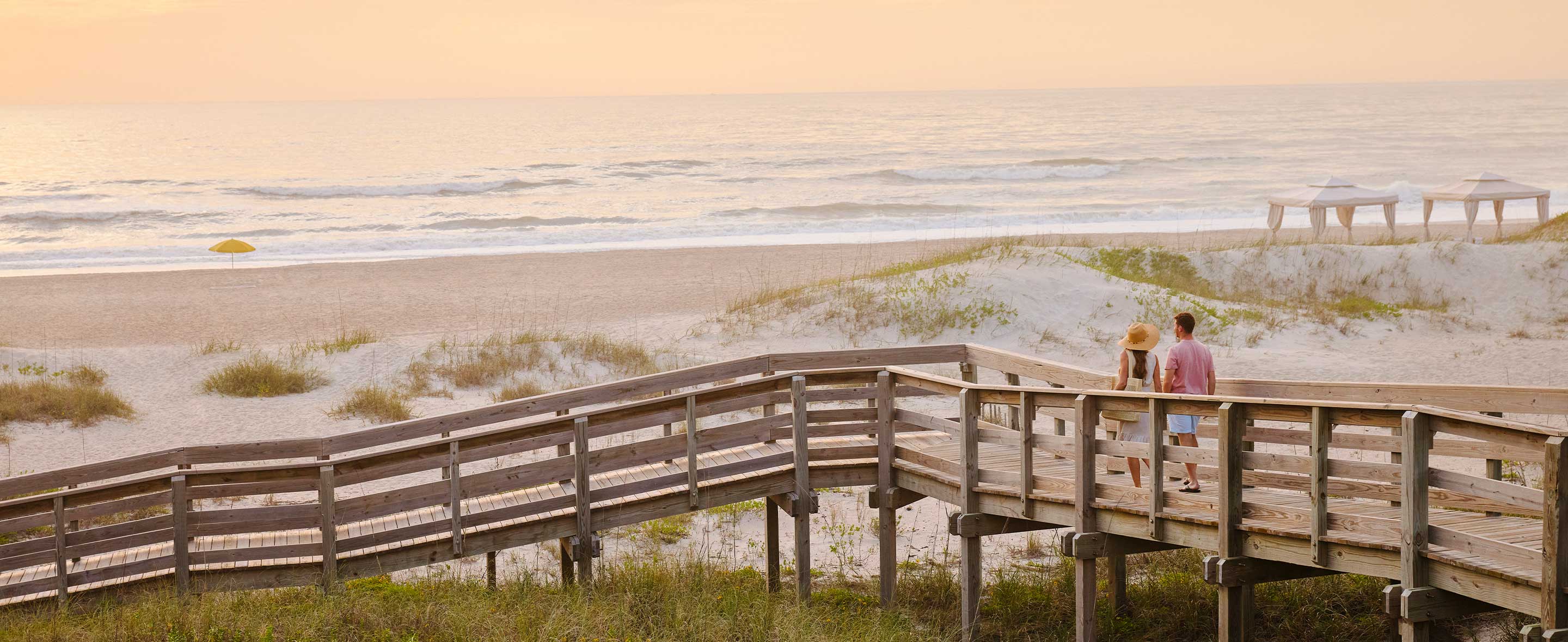 Couple walking to the beach
