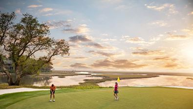 Golfing at sunset on Oak Marsh