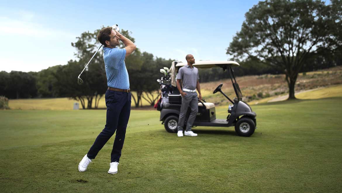 Two men golfing.