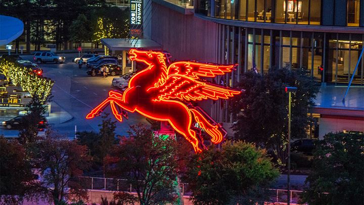 Pegasus lit up at night.