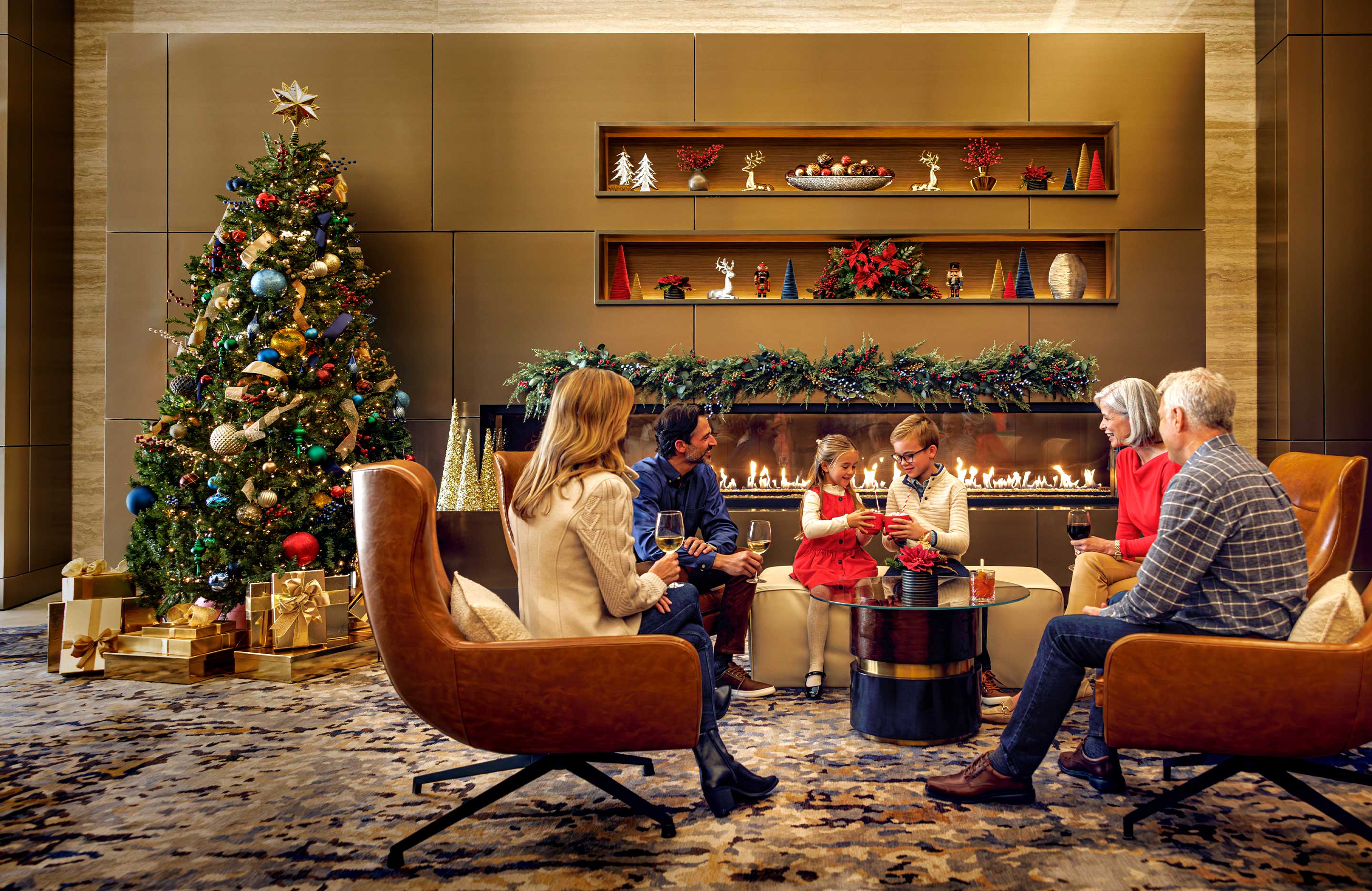 Family sitting by the fireplace