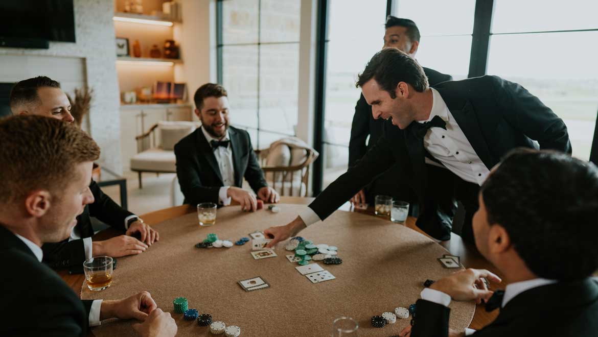 Groomsmen playing cards. 