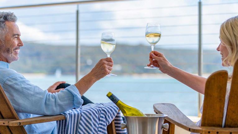 Couple having wine on a cruise ship
