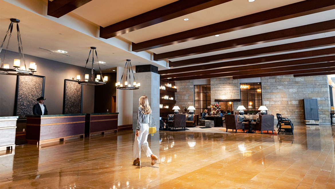 Woman walking in lobby