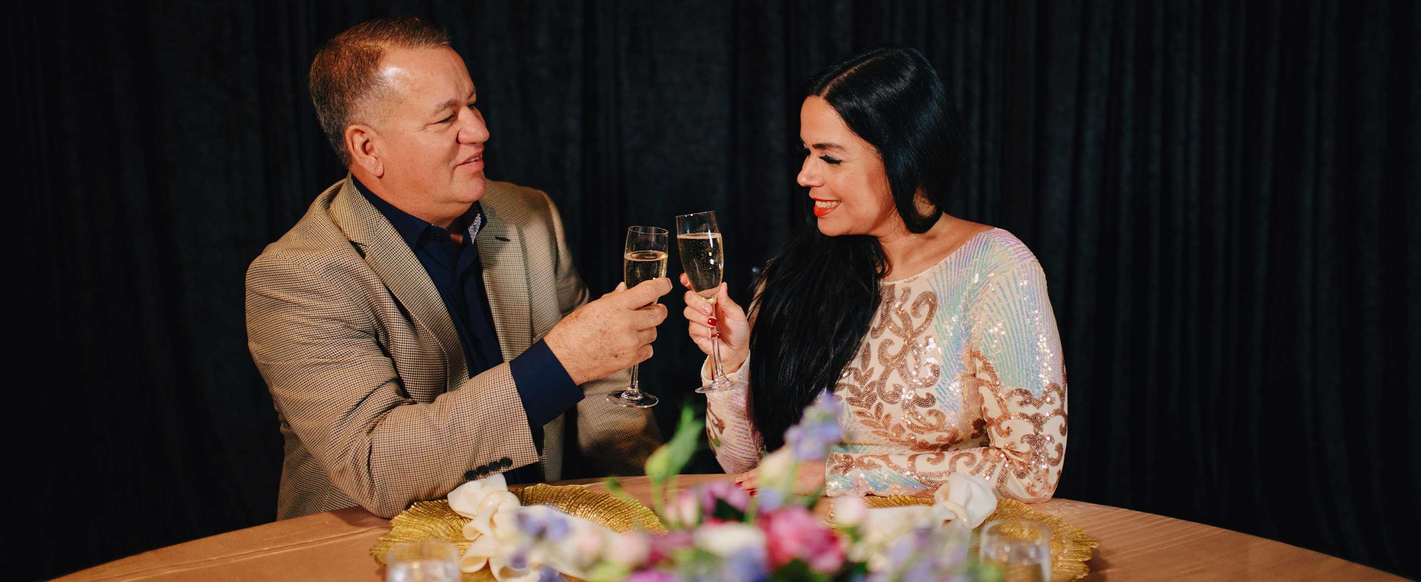 Couple toasting with a glass of champagne