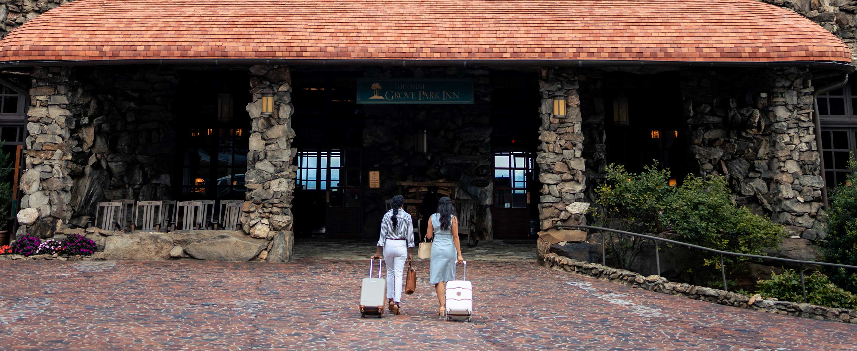 Women walking towards hotel entrance