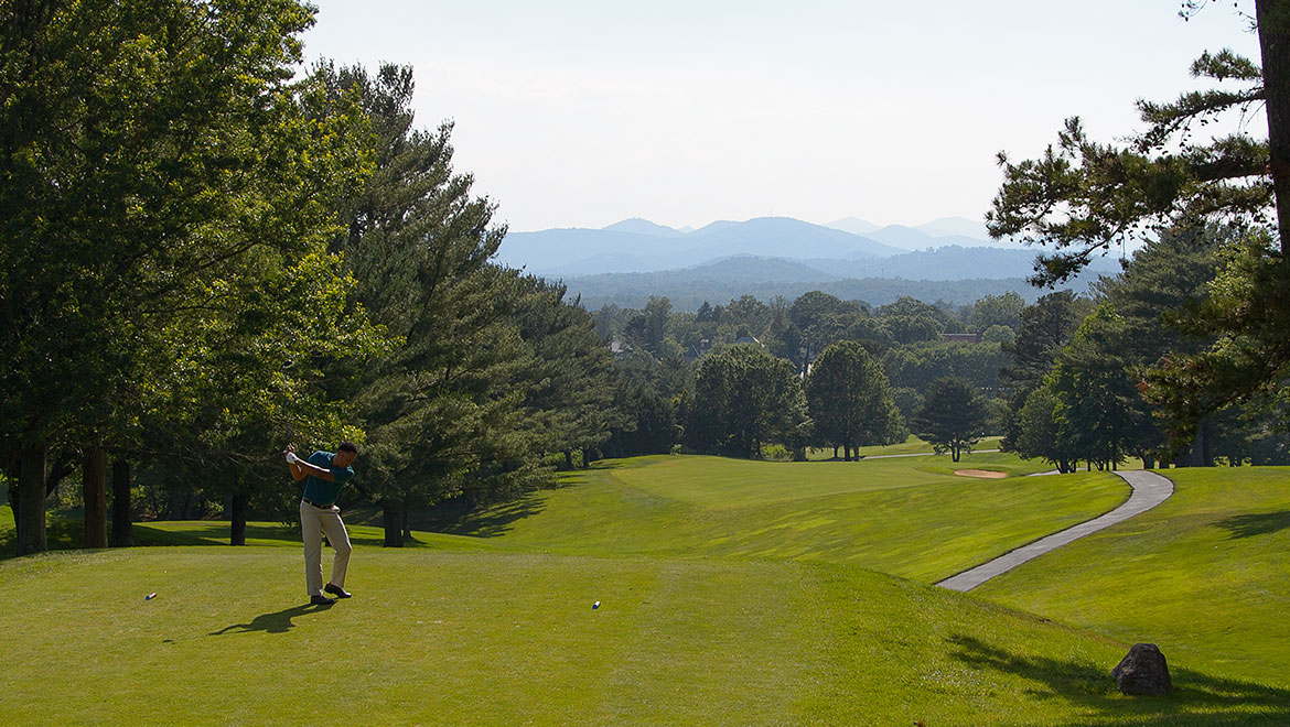 teeing off on a Blue Ridge Mountain course