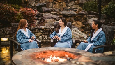 Friends gathered at a firepit