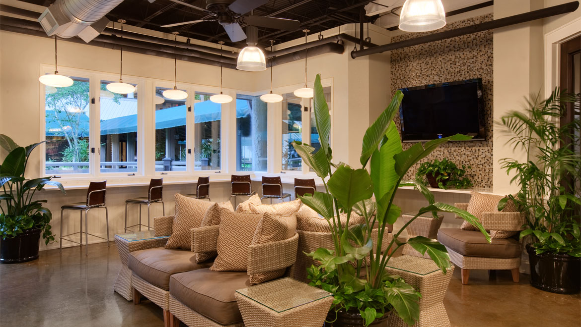 Palmetto Market seating area with flat screen TV