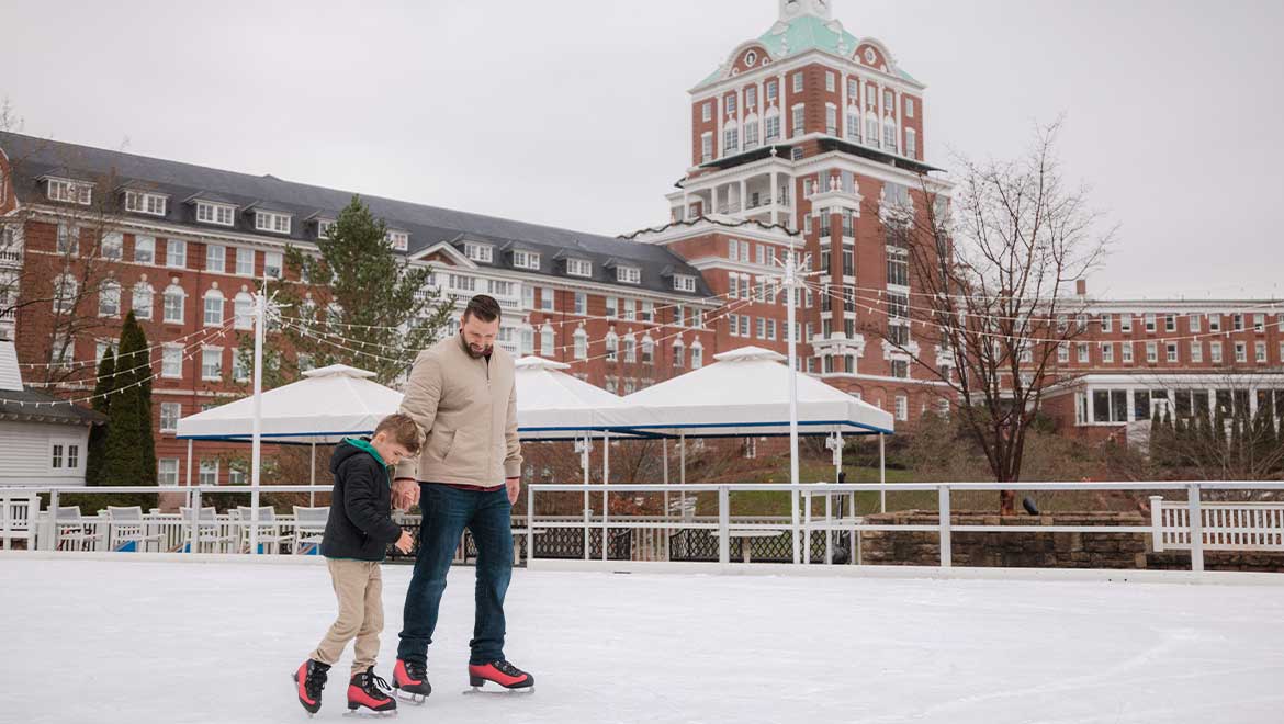 Father and son ice skating