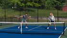 Couple playing pickleball
