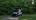 Man driving a golf cart.