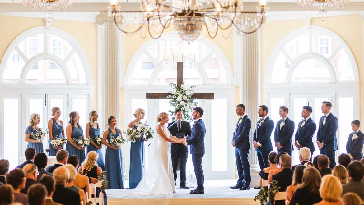 Bride and groom standing at the altar