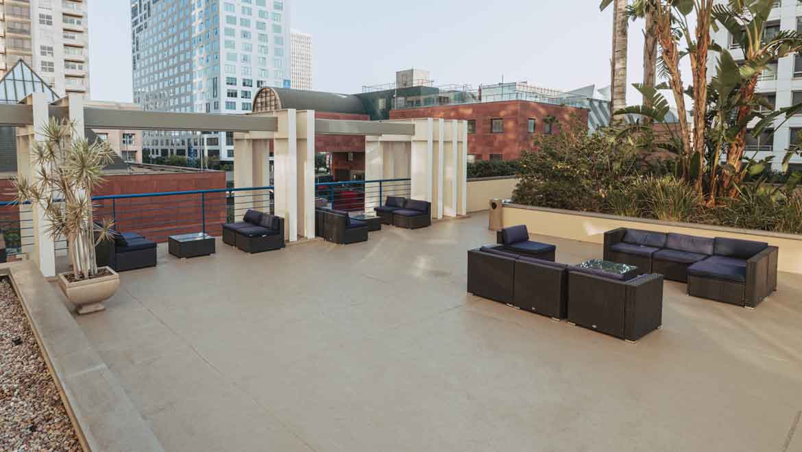 Outdoor meeting space with seating areas.