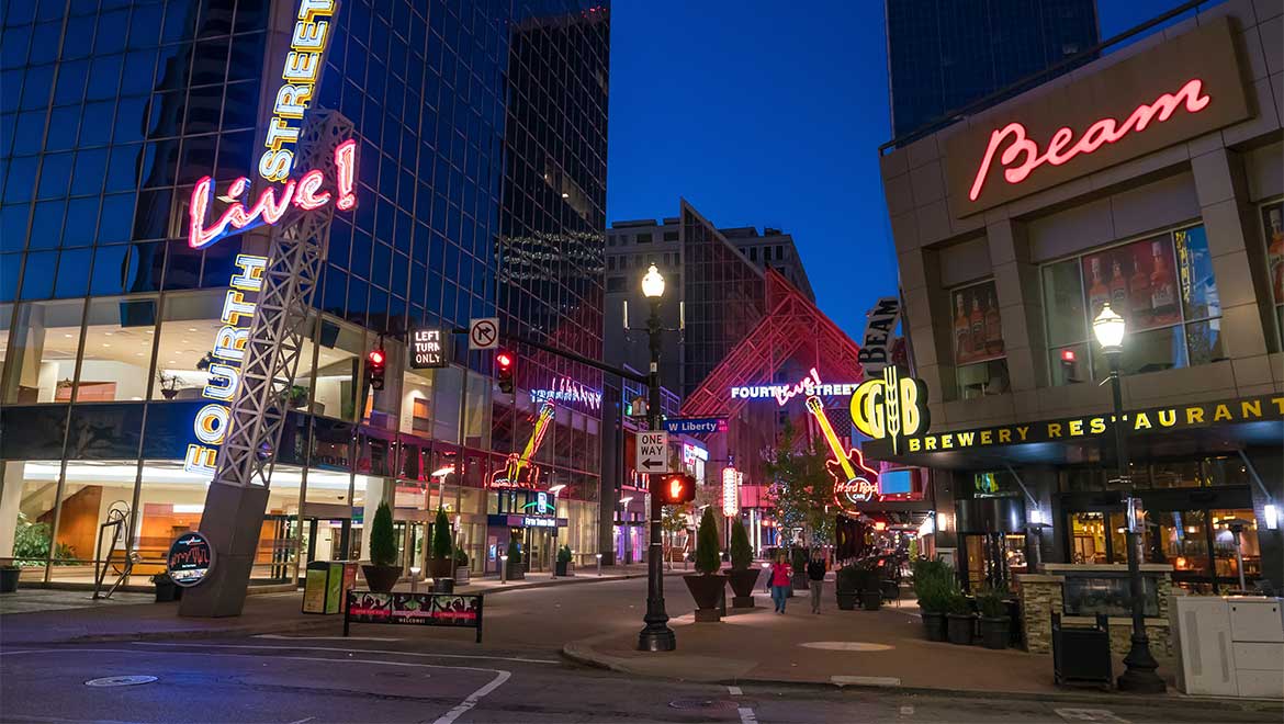 4th street lit up at night.