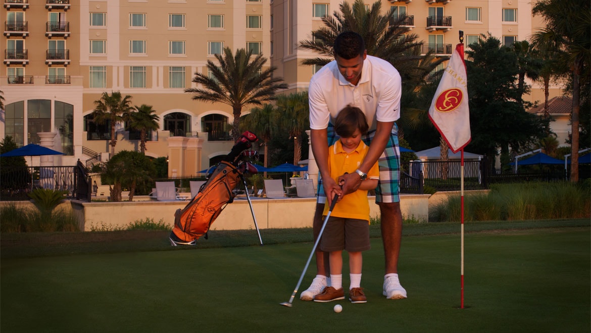 Father & son golfing in Orlando