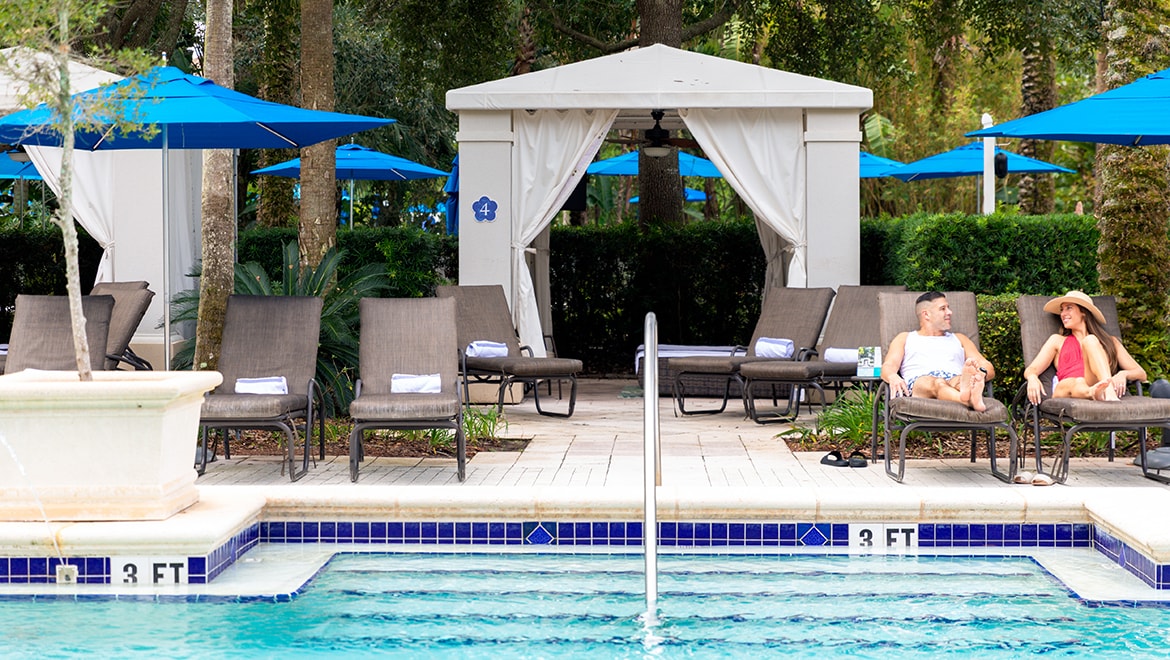 people relaxing at Omni Orlando adult pool