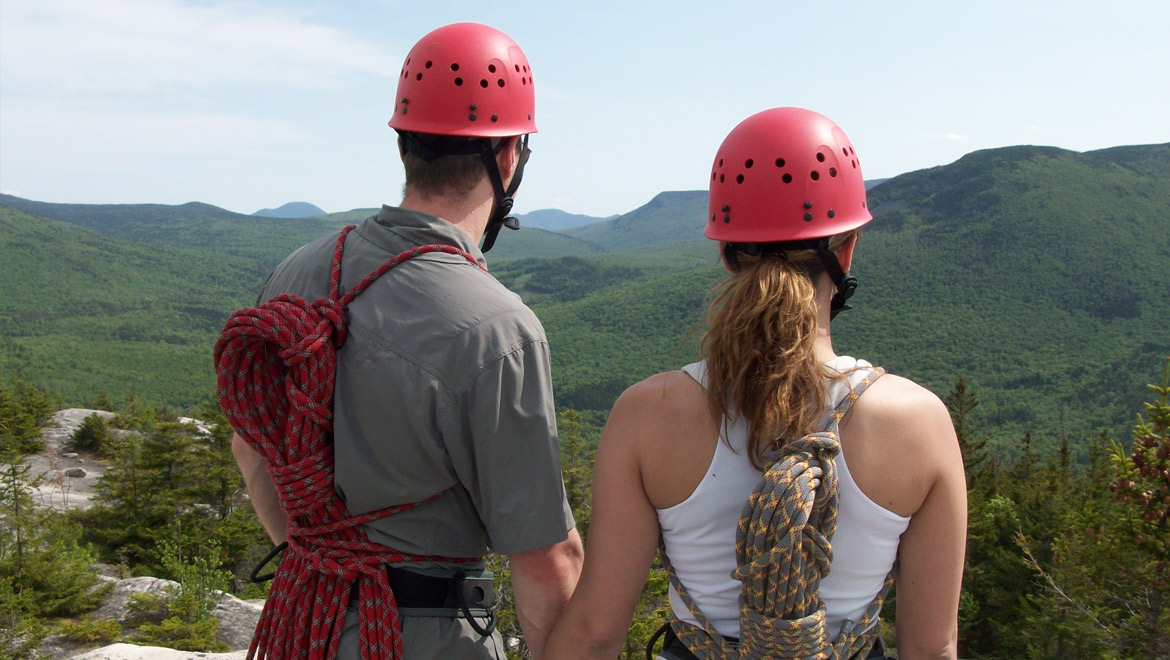 People preparing to rock climb