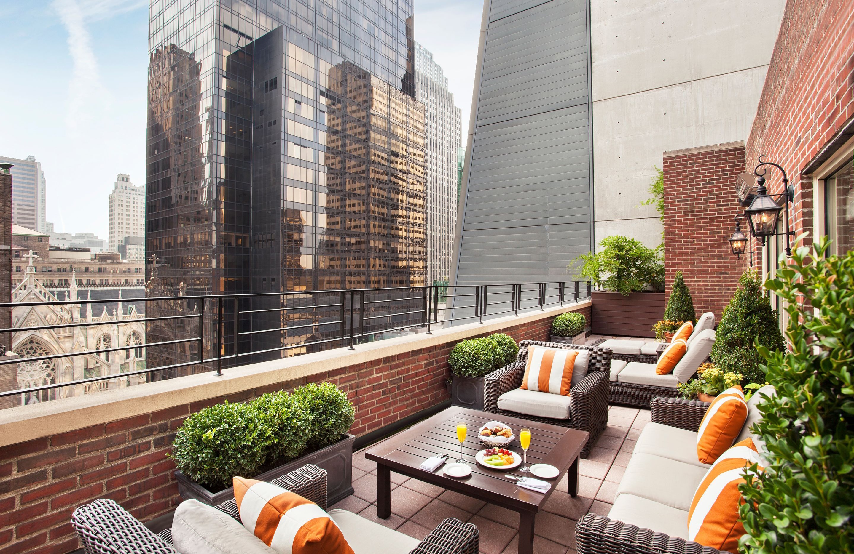 Elevated patio with view of the city.