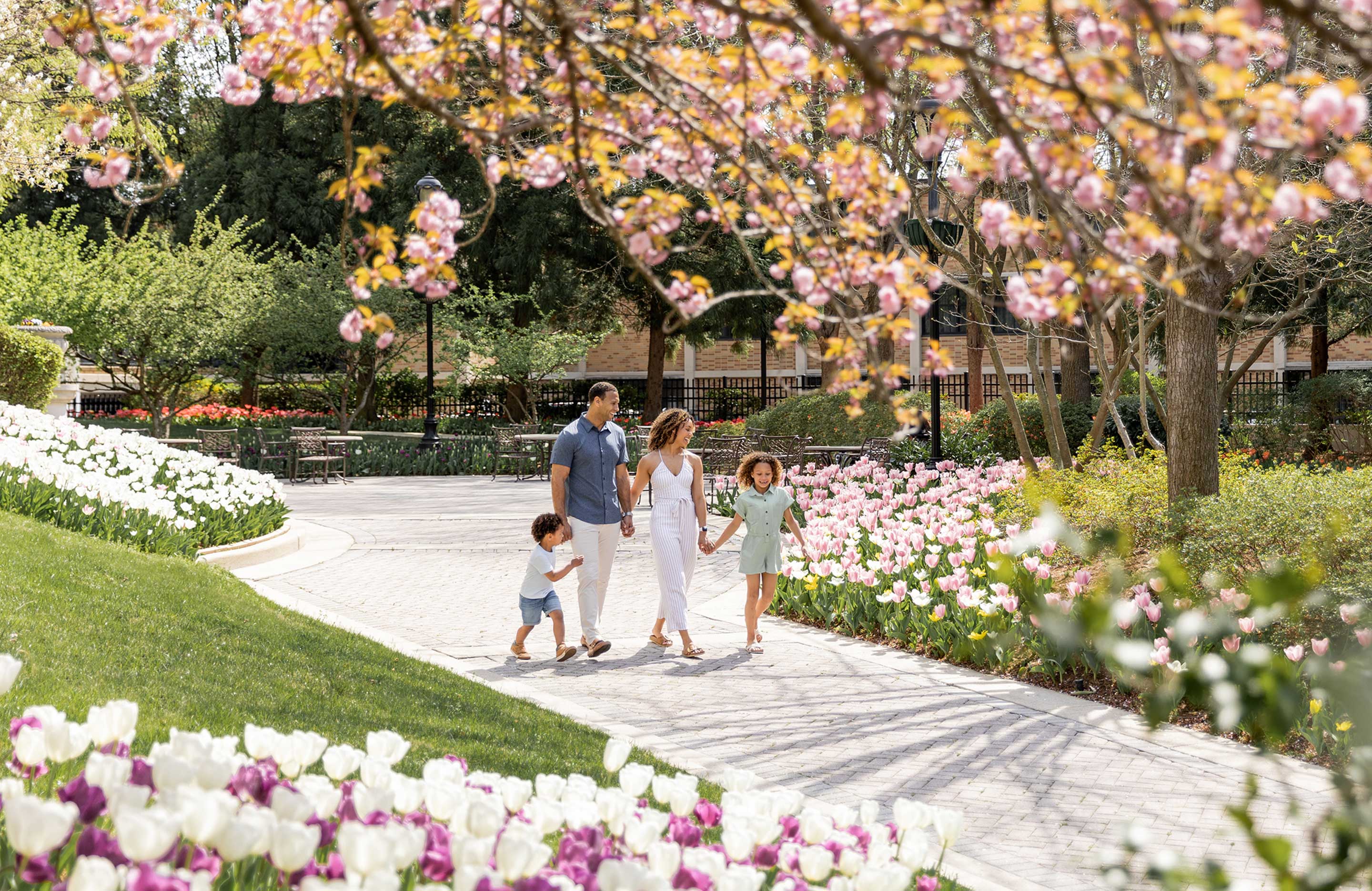 Family walking outside at Omni Shoreham
