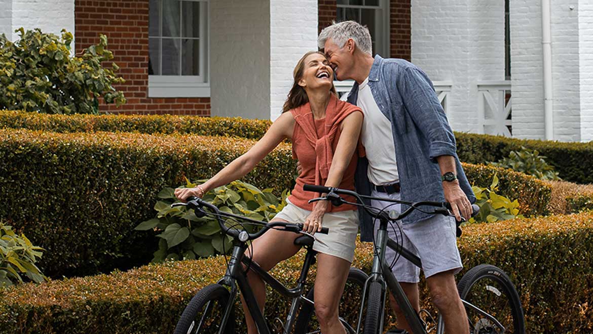 Couple riding bikes