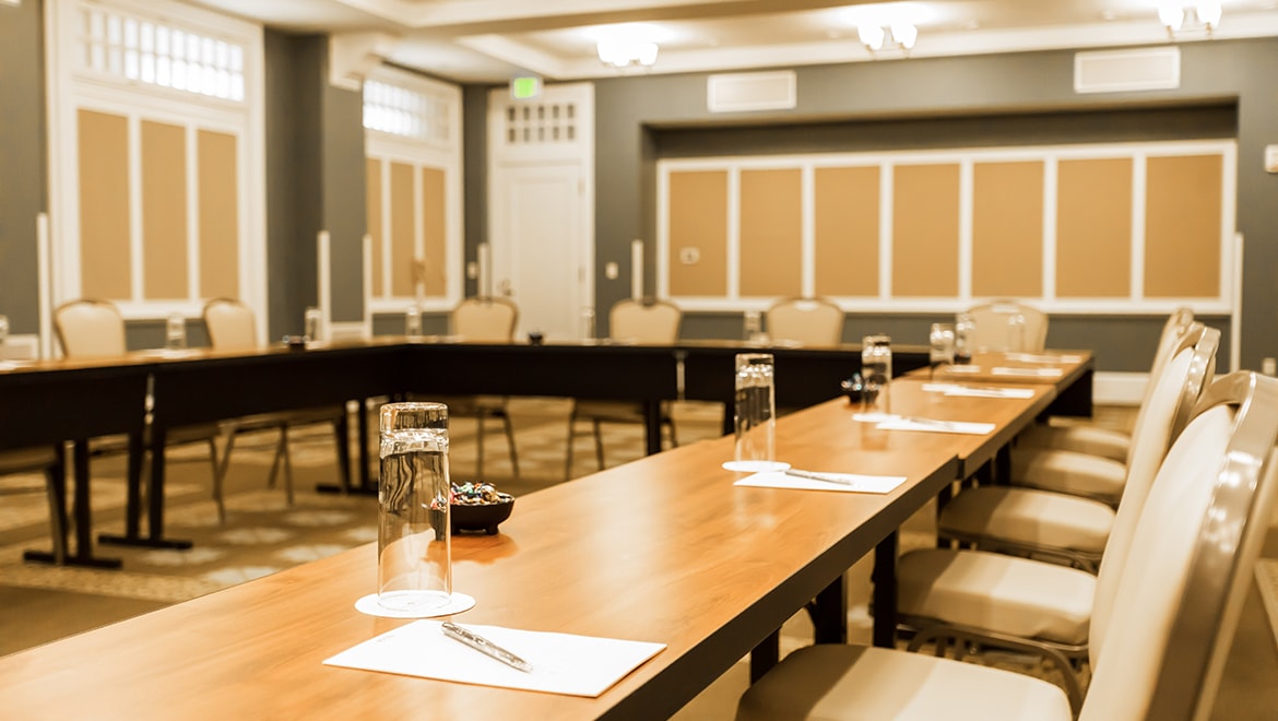 Horseshoe shape meeting space.