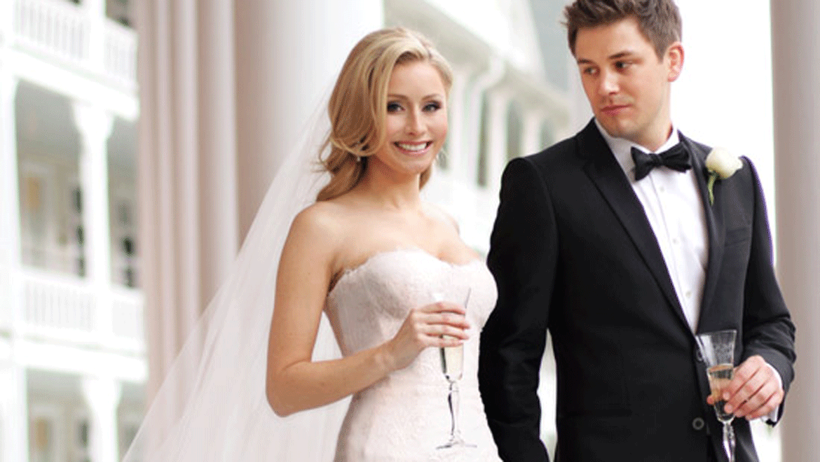 Bride and Groom drinking champagne
