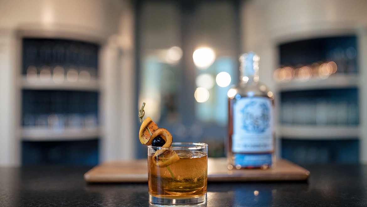 Cocktail in tumbler.