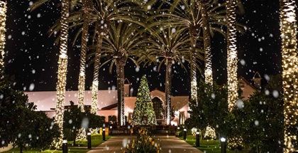 Exterior of hotel with snow falling