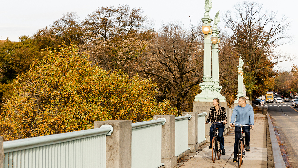 man and woman on bikes